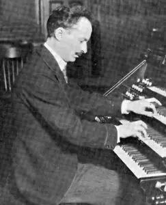 Photograph of Pietro Yon at the organ. Composer of Gesu Bambino by Pietro Yon arranged for any saxophone solo with piano